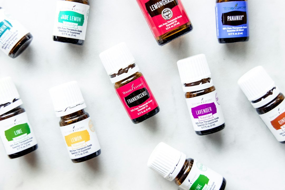 Collection of amber essential oil bottles