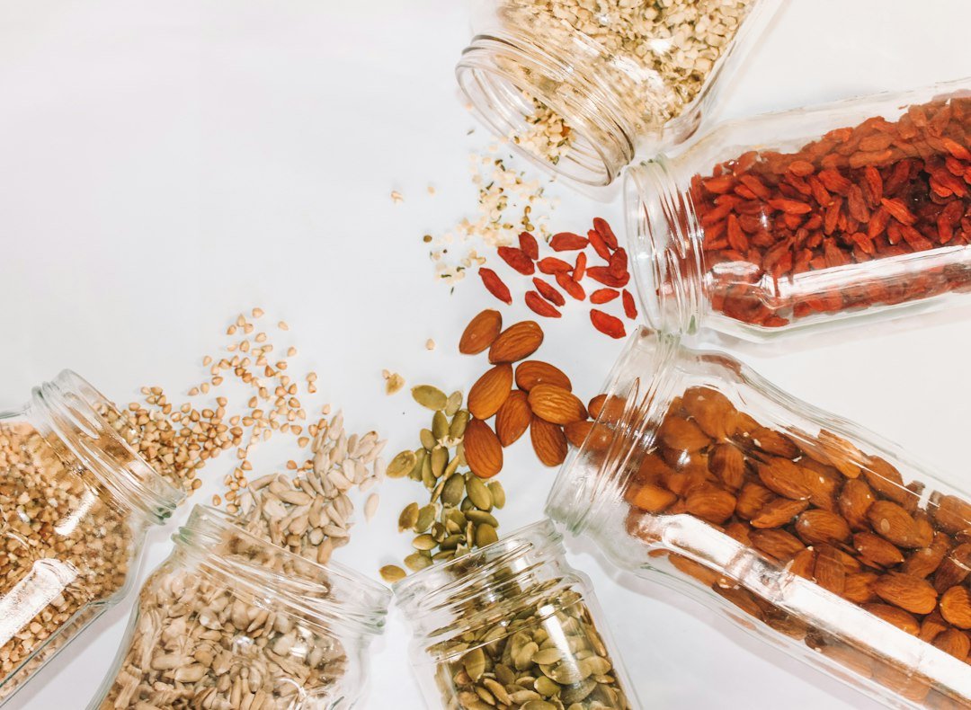 Dry pantry staples stored in clear labelled jars