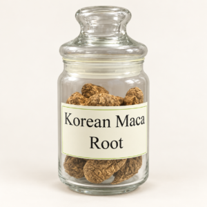 Korean Maca Root in a clear glass jar on a warm white studio background