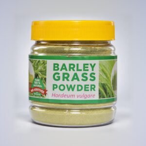 Sara Barley Grass Powder in its original clear plastic jar with yellow cap and authentic photographed label, on a neutral studio background
