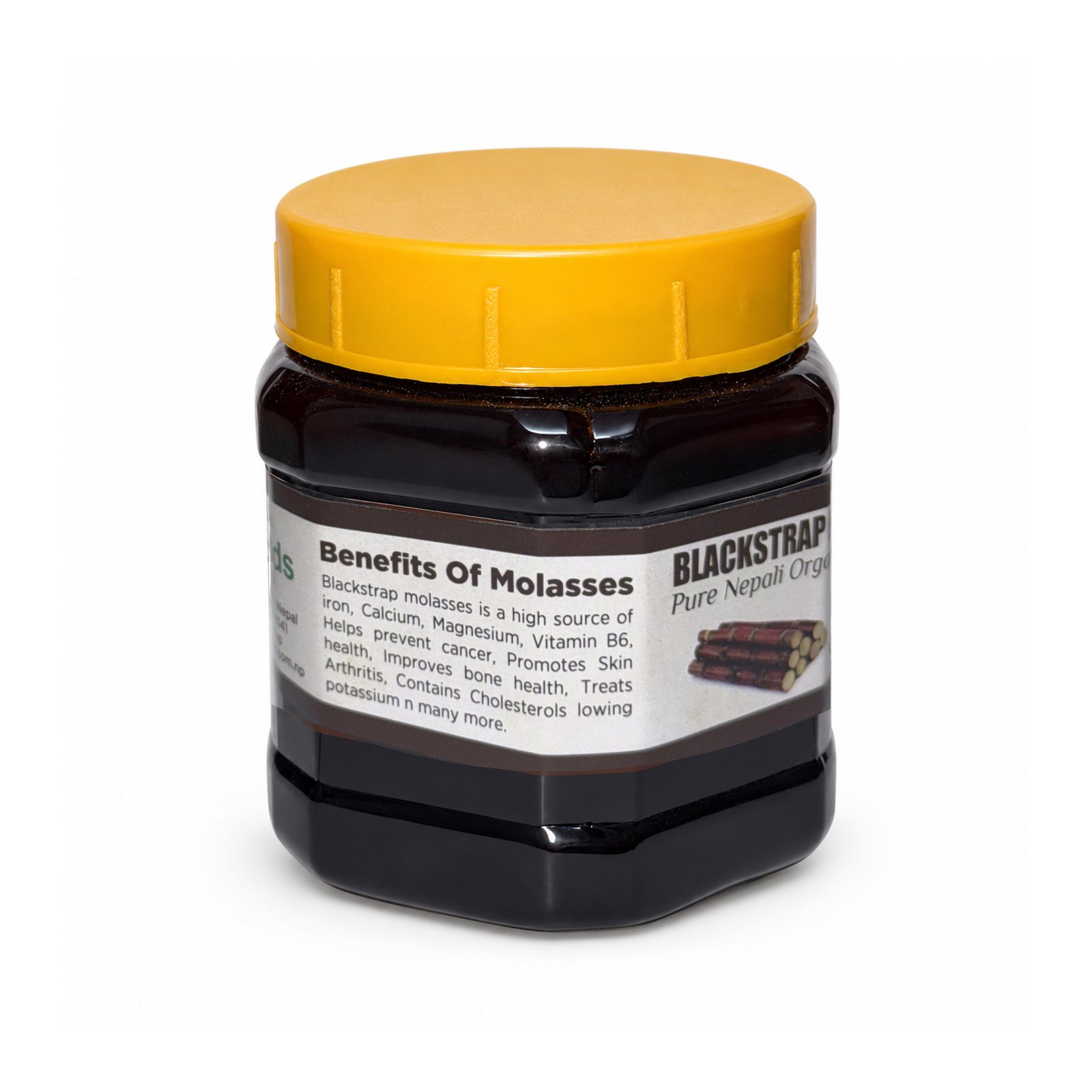 Original Blackstrap Molasses jar with yellow cap and brown label, showing its printed reverse label on white